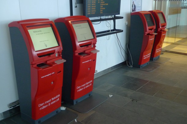 The robot-like check-in assistants at Tromsø airport in Norway